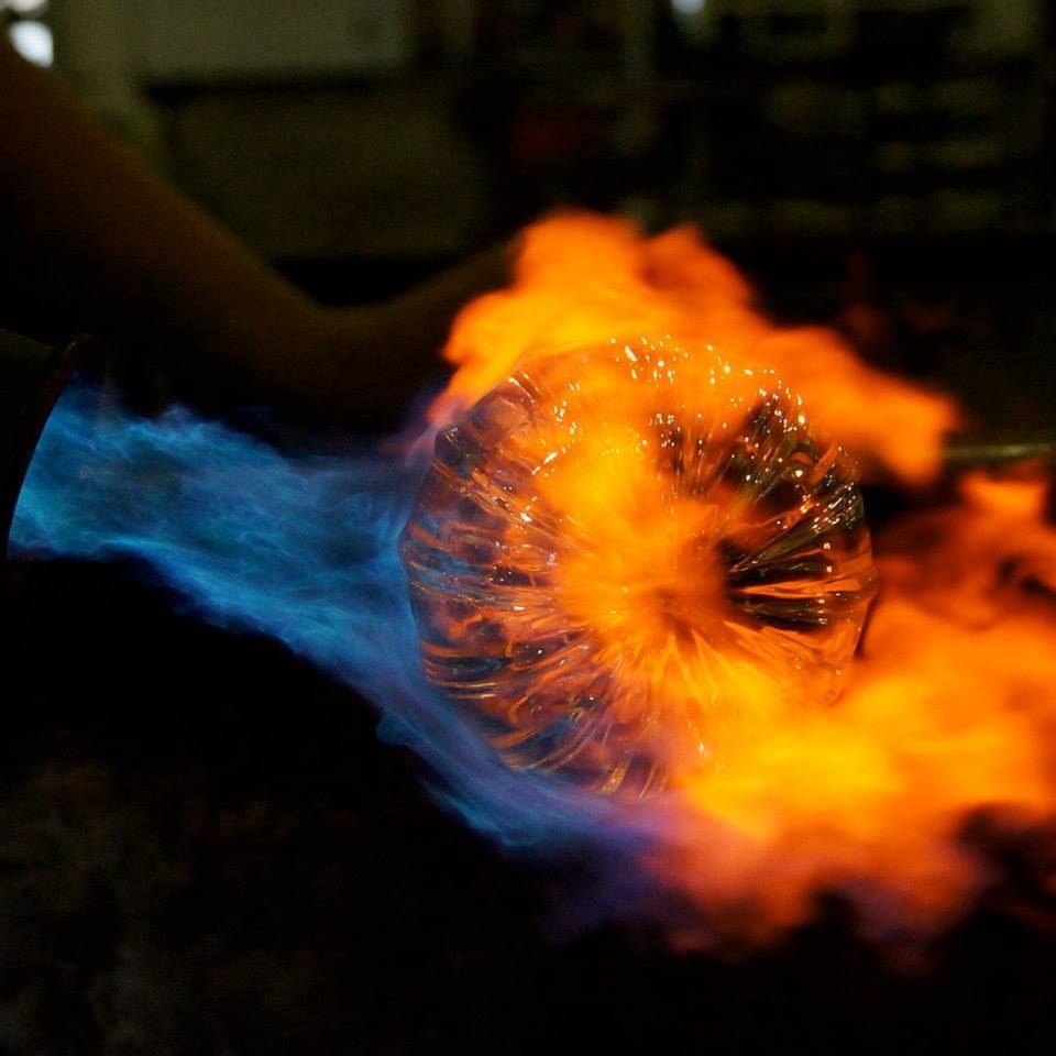 Glass pumpkin engulfed in flames glass pumpkin engulfed in torch flames
